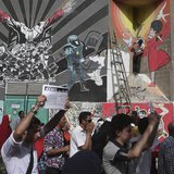 Protesters chant anti-Mursi and anti-Muslim Brotherhood slogans near graffiti during a demonstration in a street leading to Tahrir square, i Protesters chant anti-Mursi and anti-Muslim Brotherhood slogans near graffiti during a demonstration in a street leading to Tahrir square, i