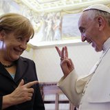 Pope Francis (R) gestures as he talks to German Chancellor Angela Merkel during a private audience at the Vatican, May 18, 2013. REUTERS/Gre Pope Francis (R) gestures as he talks to German Chancellor Angela Merkel during a private audience at the Vatican, May 18, 2013. REUTERS/Gre