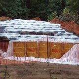 This shot of a number of the barrels stored in a pit was supplied by the EPA. 