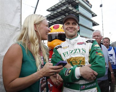 Ed Carpenter Racing driver Ed Carpenter of the U.S. celebrates with his wife Heather after taking the pole position in the Indianapolis 500 Ed Carpenter Racing driver Ed Carpenter of the U.S. celebrates with his wife Heather after taking the pole position in the Indianapolis 500