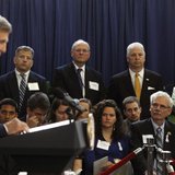 Family members of deceased State Department diplomat Anne Smedinghoff, (front row L-R) sister Regina, father Tom, and mother Mary Beth liste Family members of deceased State Department diplomat Anne Smedinghoff, (front row L-R) sister Regina, father Tom, and mother Mary Beth liste