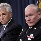 U.S. Secretary of Defense Chuck Hagel (L) and Joint Chiefs of Staff General Martin Dempsey hold a joint news conference at the Pentagon in W U.S. Secretary of Defense Chuck Hagel (L) and Joint Chiefs of Staff General Martin Dempsey hold a joint news conference at the Pentagon in W
