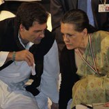 Rahul Gandhi, a lawmaker, speaks to Sonia Gandhi (R), who is his mother and India's ruling Congress party chief, during the Indian National Rahul Gandhi, a lawmaker, speaks to Sonia Gandhi (R), who is his mother and India's ruling Congress party chief, during the Indian National