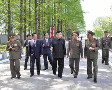 North Korean leader Kim Jong-un (C) visits the "February 20 factory of the Korean People's Army" in this photo released by North Korea's Cen North Korean leader Kim Jong-un (C) visits the "February 20 factory of the Korean People's Army" in this photo released by North Korea's Cen