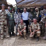 French Defence Minister Jean-Yves Le Drian (C) poses for a picture with French and Malian army officers at the French military base at the a French Defence Minister Jean-Yves Le Drian (C) poses for a picture with French and Malian army officers at the French military base at the a