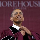 U.S. President Barack Obama adjusts his tie before receiving an honorary Doctor of Laws degree at the graduation ceremony of the class of 20 U.S. President Barack Obama adjusts his tie before receiving an honorary Doctor of Laws degree at the graduation ceremony of the class of 20