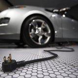 A plug is seen coming from the Chevrolet Volt electric car during the North American International Auto Show in Detroit, Michigan January 13 A plug is seen coming from the Chevrolet Volt electric car during the North American International Auto Show in Detroit, Michigan January 13