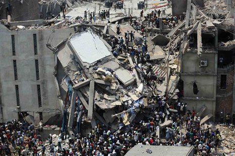 People rescue garment workers trapped under rubble at the Rana Plaza building after it collapsed, in Savar, 30 km (19 miles) outside Dhaka, People rescue garment workers trapped under rubble at the Rana Plaza building after it collapsed, in Savar, 30 km (19 miles) outside Dhaka,