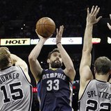 Memphis Grizzlies center Marc Gasol (C) shoots against San Antonio Spurs forward Matt Bonner (L) and center Tiago Splitter during the second Memphis Grizzlies center Marc Gasol (C) shoots against San Antonio Spurs forward Matt Bonner (L) and center Tiago Splitter during the second