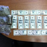 Drugs and cash seized from van during weekend traffic stop.
