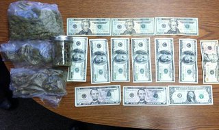 Drugs and cash seized from van during weekend traffic stop. Drugs and cash seized from van during weekend traffic stop.
