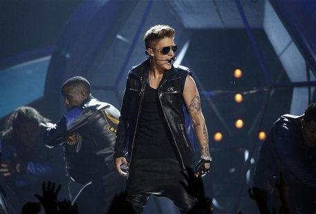 Singer Justin Bieber performs during the Billboard Music Awards at the MGM Grand Garden Arena in Las Vegas, Nevada May 19, 2013. REUTERS/Ste Singer Justin Bieber performs during the Billboard Music Awards at the MGM Grand Garden Arena in Las Vegas, Nevada May 19, 2013. REUTERS/Ste