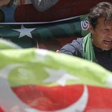 Imran Khan, Pakistani cricketer-turned-politician and chairman of political party Pakistan Tehreek-e-Insaf (PTI), addresses his supporters a Imran Khan, Pakistani cricketer-turned-politician and chairman of political party Pakistan Tehreek-e-Insaf (PTI), addresses his supporters a