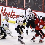 Ottawa Senators' Colin Greening (R) celebrates after scoring the game winning goal on Pittsburgh Penguins goalie Tomas Vokoun (L) during the Ottawa Senators' Colin Greening (R) celebrates after scoring the game winning goal on Pittsburgh Penguins goalie Tomas Vokoun (L) during the