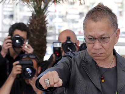 Director Takashi Miike poses during a photocall for the film "Wara No Tate" (Shield of Straw) at the 66th Cannes Film Festival in Cannes May Director Takashi Miike poses during a photocall for the film "Wara No Tate" (Shield of Straw) at the 66th Cannes Film Festival in Cannes May