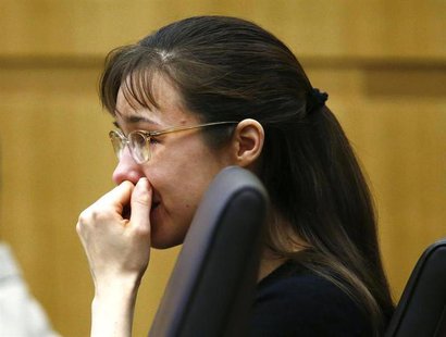 Jodi Arias cries as she listens to Steven Alexander, brother of murder victim Travis Alexander, makes his victim impact statement to the jur Jodi Arias cries as she listens to Steven Alexander, brother of murder victim Travis Alexander, makes his victim impact statement to the jur