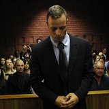 Oscar Pistorius stands in the dock ahead of court proceedings at the Pretoria magistrates court February 22, 2013. REUTERS/Siphiwe Sibeko Oscar Pistorius stands in the dock ahead of court proceedings at the Pretoria magistrates court February 22, 2013. REUTERS/Siphiwe Sibeko