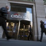 Passersby walk in front of a Citibank branch in New York, October 16, 2012. REUTERS/Keith Bedford Passersby walk in front of a Citibank branch in New York, October 16, 2012. REUTERS/Keith Bedford