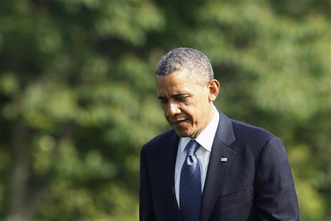 U.S. President Barack Obama crosses the South Lawn as he returns from travel to Atlanta via Marine One, at the White House in Washington, Ma U.S. President Barack Obama crosses the South Lawn as he returns from travel to Atlanta via Marine One, at the White House in Washington, Ma