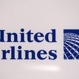 A logo is pictured on a wall during a news conference announcing the merger between Continental Airlines and United Airlines in New York, Ma A logo is pictured on a wall during a news conference announcing the merger between Continental Airlines and United Airlines in New York, Ma