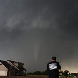 Storm chaser videographer and photographer Brad Mack records a tornado near a home in South Haven, in Kansas May 19, 2013.
REUTERS/Gene Blevins Storm chaser videographer and photographer Brad Mack records a tornado near a home in South Haven, in Kansas May 19, 2013.
REUTERS/Gene Blevins