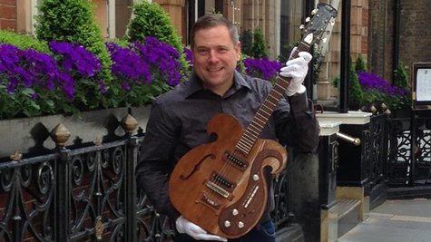Image courtesy of Darren Julien with guitar; Facebook.com/JuliensAuctions (via ABC News Radio) Image courtesy of Darren Julien with guitar; Facebook.com/JuliensAuctions (via ABC News Radio)