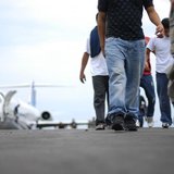 Illegal immigrants from El Salvador arrive at the Comalapa international airport after being deported from the U.S. in Comalapa, on the outs Illegal immigrants from El Salvador arrive at the Comalapa international airport after being deported from the U.S. in Comalapa, on the outs