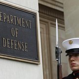 A U.S. Marine, who is part of a military honor guard, takes his position before a welcoming ceremony for German Defense Minister Thomas de M A U.S. Marine, who is part of a military honor guard, takes his position before a welcoming ceremony for German Defense Minister Thomas de M