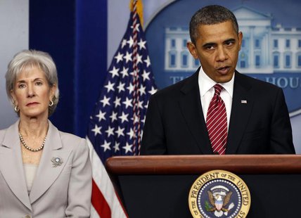 President Barack Obama makes a statement next to Secretary of HHS Kathleen Sebelius about contraceptive care funding in the press room of th President Barack Obama makes a statement next to Secretary of HHS Kathleen Sebelius about contraceptive care funding in the press room of th