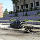 Police and investigators work at the scene of a blast in Makhachkala May 20, 2013. REUTERS/Abdula Magomedov/NewsTeam Police and investigators work at the scene of a blast in Makhachkala May 20, 2013. REUTERS/Abdula Magomedov/NewsTeam
