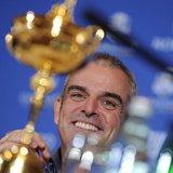 Paul McGinley of Ireland smiles near the Ryder Cup during a news conference after being named the European Ryder Cup captain at the St. Regi Paul McGinley of Ireland smiles near the Ryder Cup during a news conference after being named the European Ryder Cup captain at the St. Regi