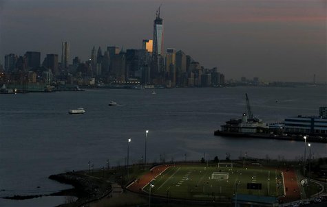 People play soccer on a pitch on the banks of the Hudson River in front of the New York City skyline as seen from Weehawken, New Jersey, Apr People play soccer on a pitch on the banks of the Hudson River in front of the New York City skyline as seen from Weehawken, New Jersey, Apr