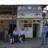 People wait for buses at the al-Abassin bus station, near Damascus' Jobar neighbourhood which is controlled by the Islamist Syrian rebel gro People wait for buses at the al-Abassin bus station, near Damascus' Jobar neighbourhood which is controlled by the Islamist Syrian rebel gro