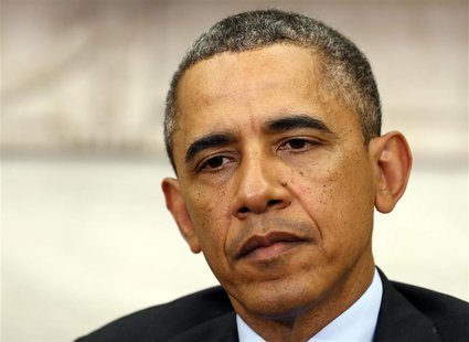 U.S. President Barack Obama listens while meeting with Myanmar's President Thein Sein in the Oval Office at the White House in Washington Ma U.S. President Barack Obama listens while meeting with Myanmar's President Thein Sein in the Oval Office at the White House in Washington Ma