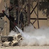 Free Syrian Army fighters react during the firing of a rocket towards forces loyal to Syria's President Bashar al-Assad in Deir al-Zor May 1 Free Syrian Army fighters react during the firing of a rocket towards forces loyal to Syria's President Bashar al-Assad in Deir al-Zor May 1
