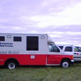 Red Cross vehicles from Sioux Falls stand by to assist in any disaster situation.  (Photo Sam Hill)