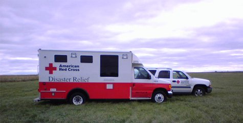 Red Cross vehicles from Sioux Falls stand by to assist in any disaster situation. (Photo Sam Hill) Red Cross vehicles from Sioux Falls stand by to assist in any disaster situation. (Photo Sam Hill)