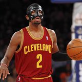 Cleveland Cavaliers point guard Kyrie Irving brings the ball up court against the New York Knicks in the second quarter of their NBA basketb Cleveland Cavaliers point guard Kyrie Irving brings the ball up court against the New York Knicks in the second quarter of their NBA basketb