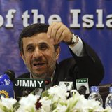 Iran's President Mahmoud Ahmadinejad speaks during a media conference at Iran's embassy after he attended the Developing-8 summit in Islamab