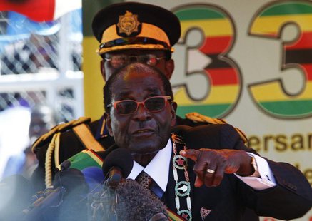 Zimbabwe's President Robert Mugabe addresses crowds gathered for the country's 33rd independence celebrations at the National Sports stadium Zimbabwe's President Robert Mugabe addresses crowds gathered for the country's 33rd independence celebrations at the National Sports stadium