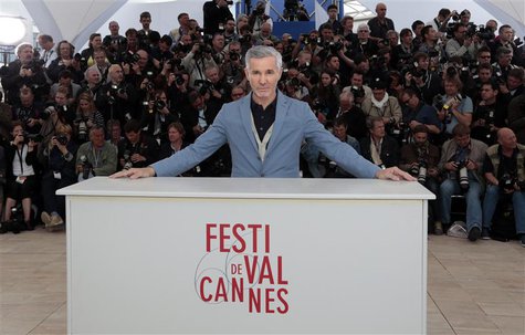 Director Baz Luhrmann poses during a photocall for the film 'The Great Gatsby' before the opening of the 66th Cannes Film Festival in Cannes Director Baz Luhrmann poses during a photocall for the film 'The Great Gatsby' before the opening of the 66th Cannes Film Festival in Cannes
