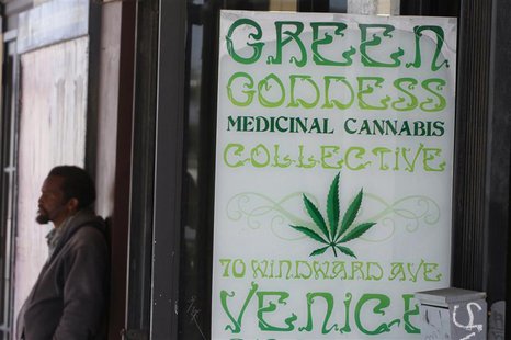 A man stands in front of a medical marijuana dispensary in Los Angeles, California, July 24, 2012. REUTERS/Jonathan Alcorn A man stands in front of a medical marijuana dispensary in Los Angeles, California, July 24, 2012. REUTERS/Jonathan Alcorn