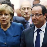 Germany's Chancellor Angela Merkel and France's President Francois Hollande (R) arrive at a European Union leaders summit in Brussels May 22 Germany's Chancellor Angela Merkel and France's President Francois Hollande (R) arrive at a European Union leaders summit in Brussels May 22