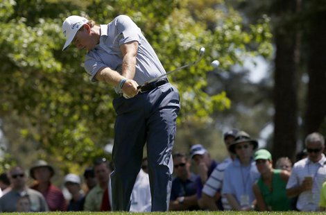 Ernie Els of South Africa hits his tee shot on the fourth hole during third round play in the 2013 Masters golf tournament at the Augusta Na Ernie Els of South Africa hits his tee shot on the fourth hole during third round play in the 2013 Masters golf tournament at the Augusta Na