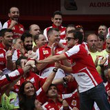 Ferrari Formula One driver Fernando Alonso of Spain (R) celebrates with his team after the Spanish F1 Grand Prix at the Circuit de Catalunya Ferrari Formula One driver Fernando Alonso of Spain (R) celebrates with his team after the Spanish F1 Grand Prix at the Circuit de Catalunya