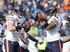 Chicago Bears line backer Brian Urlacher (54) celebrates with defensive end Julius Peppers (90) after recovering a fumble in the first half 