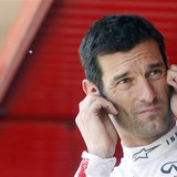 Red Bull Formula One driver Mark Webber of Australia cups his ears during the qualifying session at the Spanish F1 Grand Prix at the Circuit Red Bull Formula One driver Mark Webber of Australia cups his ears during the qualifying session at the Spanish F1 Grand Prix at the Circuit