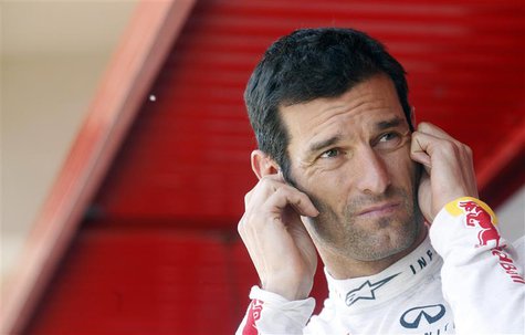 Red Bull Formula One driver Mark Webber of Australia cups his ears during the qualifying session at the Spanish F1 Grand Prix at the Circuit Red Bull Formula One driver Mark Webber of Australia cups his ears during the qualifying session at the Spanish F1 Grand Prix at the Circuit
