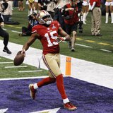 San Francisco 49ers wide receiver Michael Crabtree scores a touchdown against the Baltimore Ravens during the third quarter in the NFL Super San Francisco 49ers wide receiver Michael Crabtree scores a touchdown against the Baltimore Ravens during the third quarter in the NFL Super
