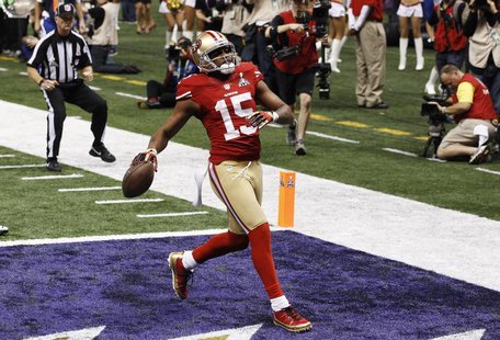 San Francisco 49ers wide receiver Michael Crabtree scores a touchdown against the Baltimore Ravens during the third quarter in the NFL Super San Francisco 49ers wide receiver Michael Crabtree scores a touchdown against the Baltimore Ravens during the third quarter in the NFL Super